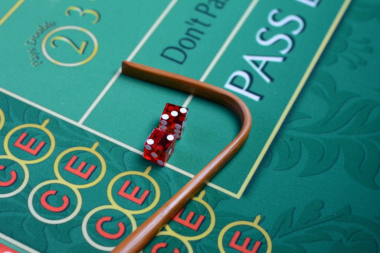 FairPlay Live Casino Studio: a live dealer at a table under studio lighting with a LIVE marker on screen