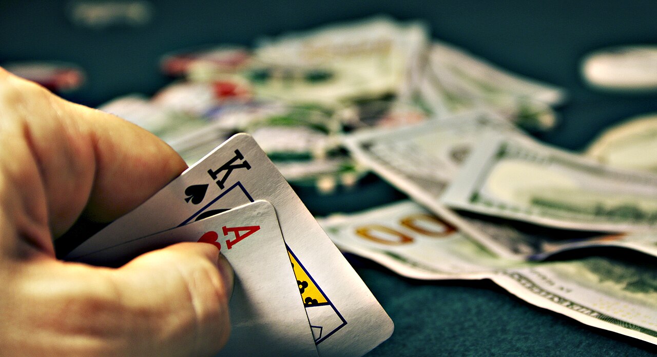 FairPlay Poker Table: chips and community cards laid out on a green baize table